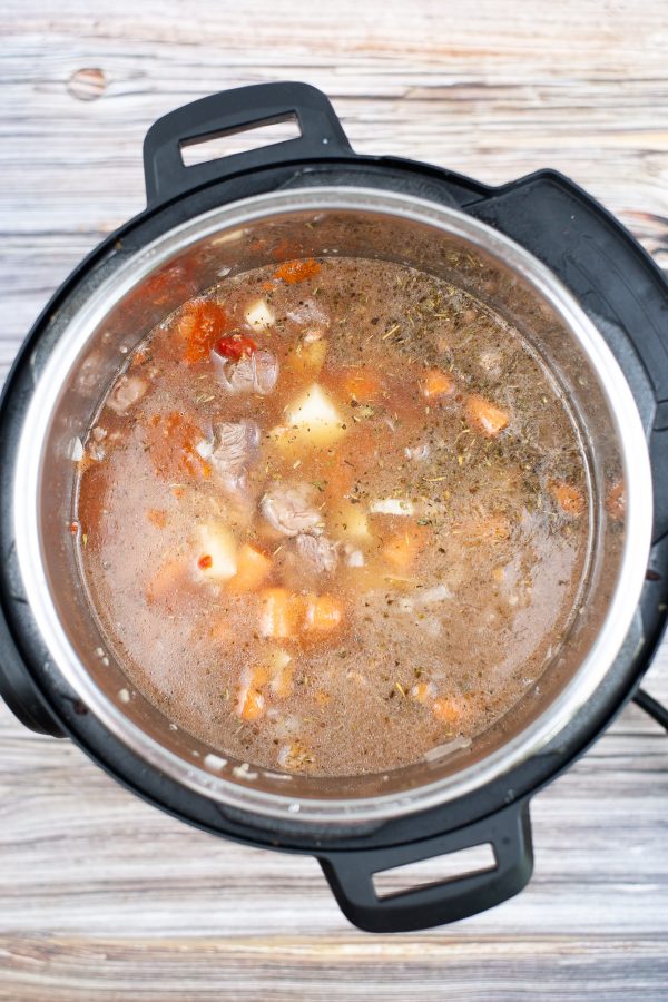 uncooked beef stew in the instant pot overhead